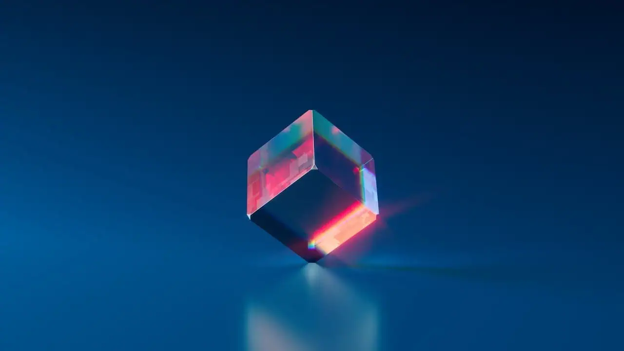 Vibrant acrylic cube with colourful reflections on a dark blue background, representing creativity and innovation, suitable for technology and design-focused websites.