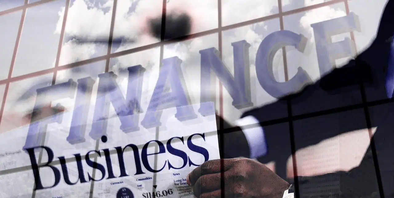 Finance and business concept reflected on office window with person in background, representing financial planning, investment, and corporate growth.