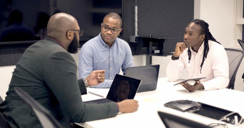Business men having meeting in office