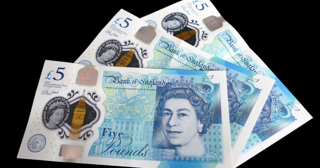 Three british 5 pound bank notes on a black background. Small donations can be made on my profile page. Thanks for visiting, hope my work is useful to you : )