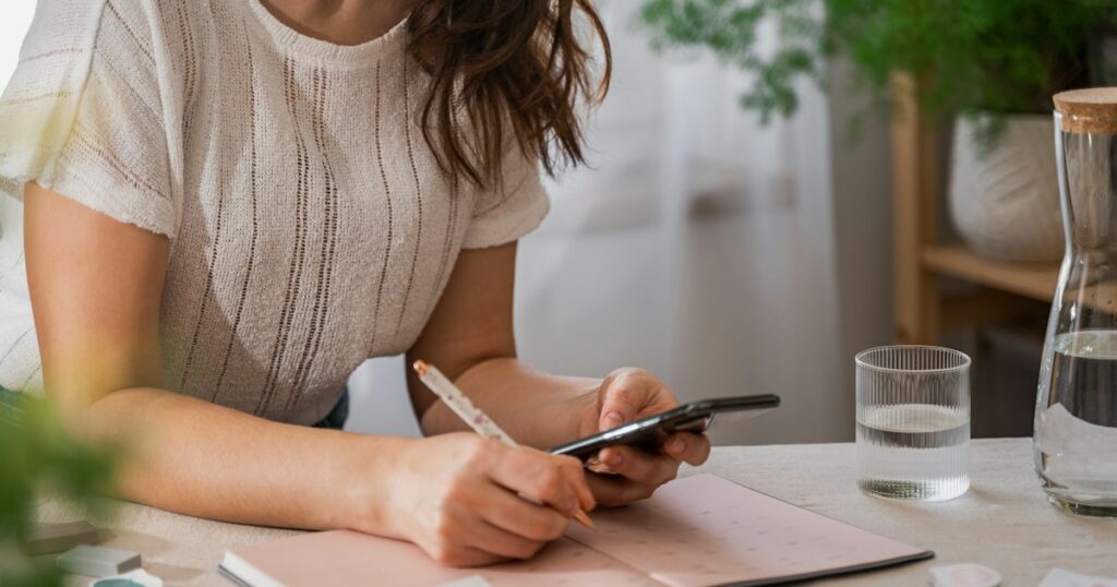 girl planing a week at home office in bright room