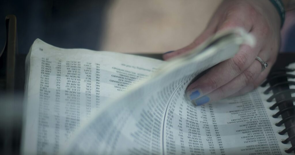 Kat flipping through the pages of the dead American soldiers at the Vietnam Veteran’s Memorial in DC. I remember looking at her nail polish and watching her fingers scan over one name, one person, two people, seven, four hundred, thousands. There were tear stains on the glass.