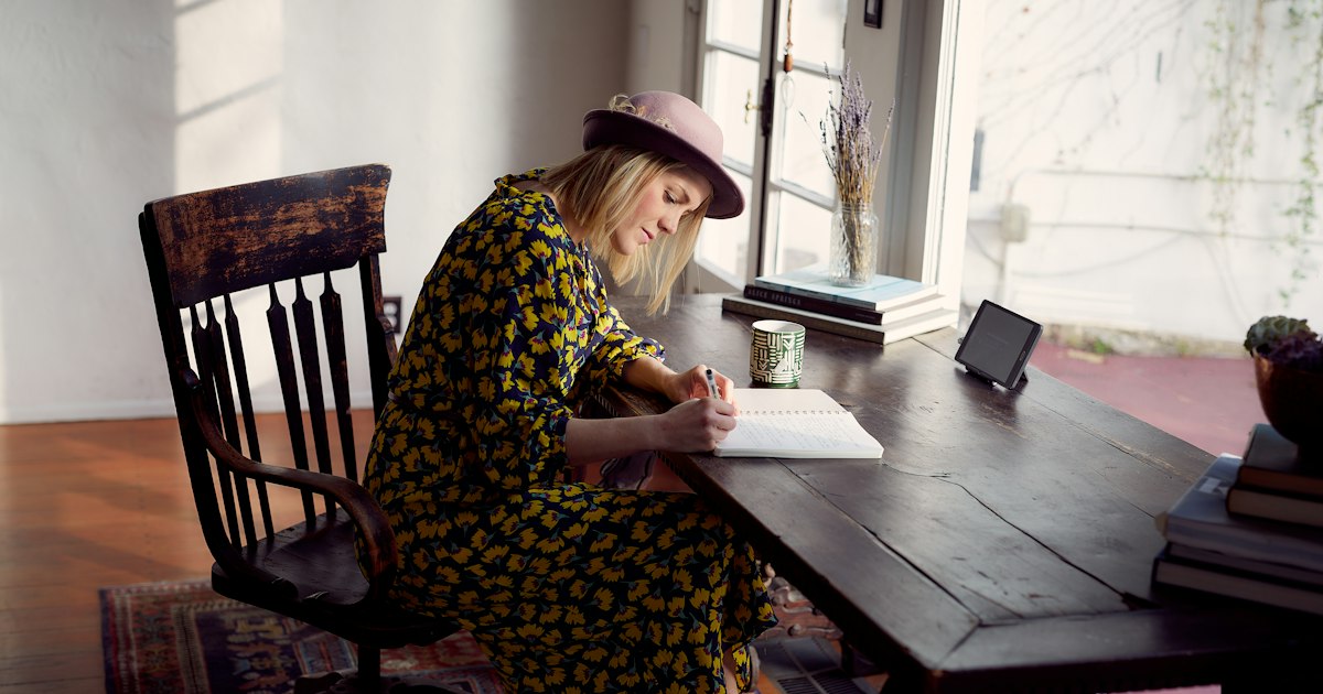 Women writing.